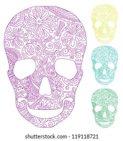 the silhouette of a skull with a primitive floral pattern