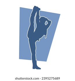 Silhouette of a slim ballet dancer female doing stretching or warming up.