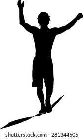 Silhouette of a slim boy walking on a slackline