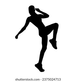 Silhouette of a slim female dance pose. Silhouette of a female in aerobic movement.