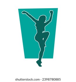 Silhouette of a slim female dance pose. Silhouette of a female in aerobic movement.