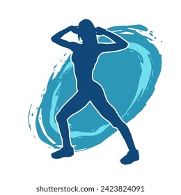 Silhouette of slim female doing exercise. Silhouette of a sporty woman doing gym workout pose. 