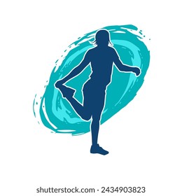 Silhouette of slim female doing exercise. Silhouette of a sporty woman doing gym workout pose. 