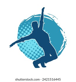 Silhouette of a slim man dancing pose. Silhouette of a male dancer in action pose.