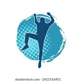 Silhouette of a slim man dancing pose. Silhouette of a male dancer in action pose.