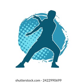 Silhouette of a slim man dancing pose. Silhouette of a male dancer in action pose.