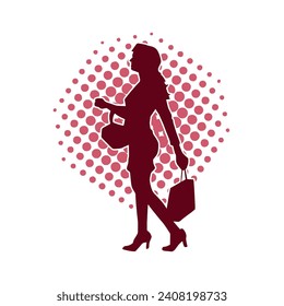 Silhouette of a slim young woman carrying shopping bags.