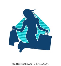 Silhouette of a slim young woman carrying shopping bags.