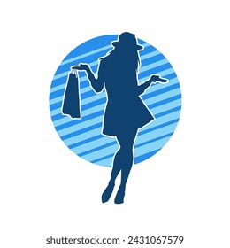 Silhouette of a slim young woman carrying shopping bags.