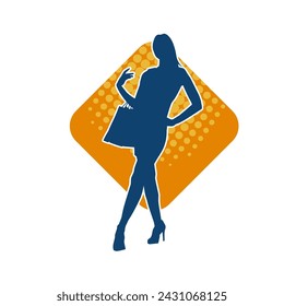 Silhouette of a slim young woman carrying shopping bags.