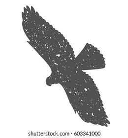 Silhouette of a soaring bird. Separately isolated image on a white background
