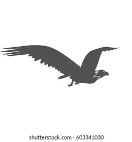 Silhouette of a soaring bird. Separately isolated image on a white background