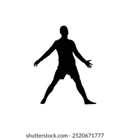 Silhouette of a soccer player celebrating a goal