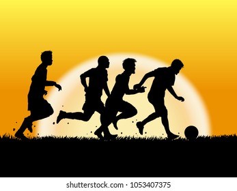 silhouette of soccer player on sunset background
