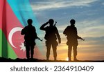 Silhouette of a soldier with Azerbaijan flag against the sunset. EPS10 vector