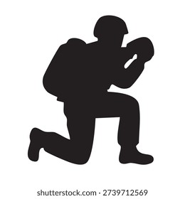 silhouette of a soldier kneeling while using binoculars for scouting during mission