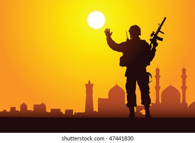 Silhouette of a soldier with mosques on the background