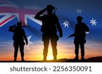Silhouette of Soldiers with Australian flag on background of sunset. Concept - Armed Force. EPS10 vector