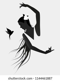 Silhouette of Spanish flamenco dancer wearing a flower in her long mane and flying swallow on white background