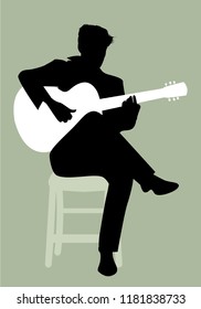 Silhouette of Spanish guitarist playing flamenco sitting on a chair