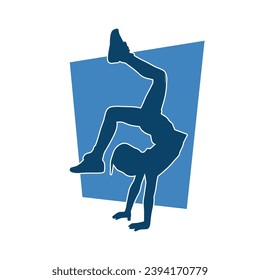 Silhouette of a sporty female doing aerobics or gymnastic action pose. Silhouette of a woman in gym doing acrobatic pose.