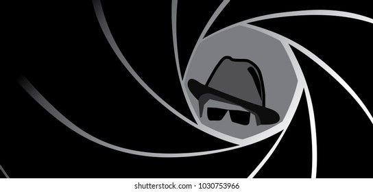 Silhouette of spy, secret agent, detective or gangster in fedora hat and sunglasses seen through a gun barrel. Vector illustration.