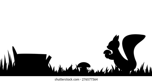 Silhouette of the squirrel in the grass by the tree stump.