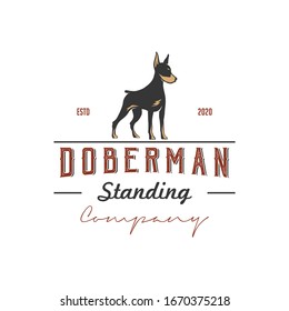 Silhouette of a standing doberman dog with retro vintage style logo design