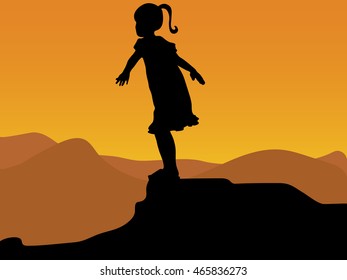Silhouette of standing girl or child flying on cliff, lady on top of the mountain at sunset with the sun in the background
