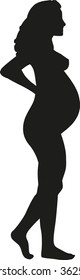 Silhouette of standing pregnant woman