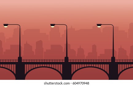 Silhouette of street lamp lined on bridge landscape