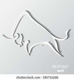 Silhouette strong wild bull on a gray background 