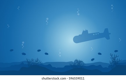Silhouette of submarine and fish on ocean