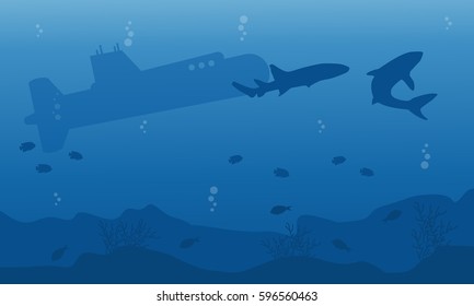 Silhouette of submarine and shark ob blue sea
