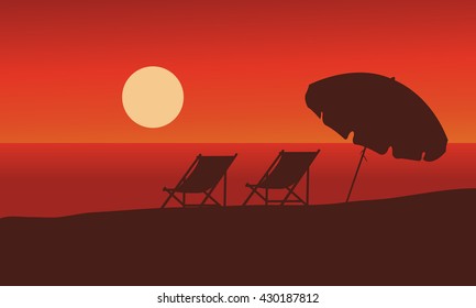 Silhouette Of Summer Beach At Sunset With Red Backgrounds