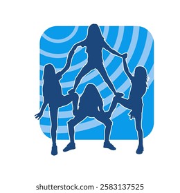 Silhouette of teenage girl cheerleaders doing acrobatics formation. 