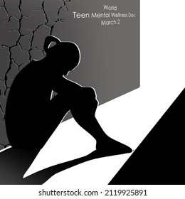 Silhouette of a teenager sitting alone with his head lowered in a quiet and dark alley, World Teen Mental Wellness Day March 2