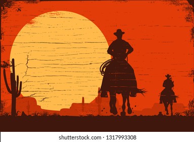 Silhouette of three cowboys riding horses on a wooden board