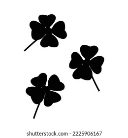silhouette of three four leaf clover leaves. simple design