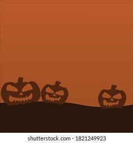 silhouette of three pumpkins on orange background