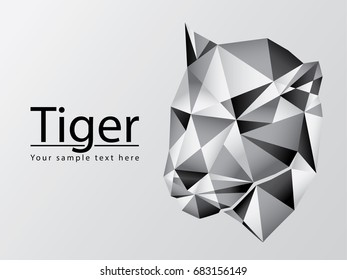 silhouette of tiger head polygonal vector graphic on grey background design with copy space for your text or company logo. geometrical triangle shape pattern with shadow. Low poly illustration design 