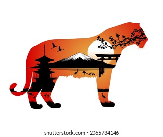 Silhouette of a tiger. Japanese landscape. Mount Fuji. Rising Sun. Blooming sakura branch. Year of the Tiger.