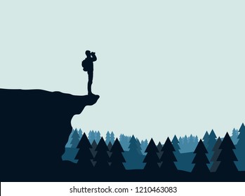 Silhouette of a tourist with a backpack on a cliff looks in the binoculars. Vector landscape of the forest