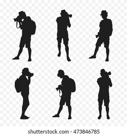 Silhouette of a tourist with a camera