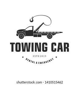 Silhouette towing car logo design