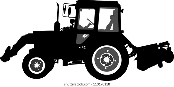 Silhouette of a tractor of road service in profile