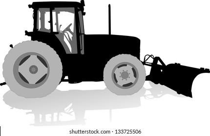 Silhouette of a tractor of road service in profile