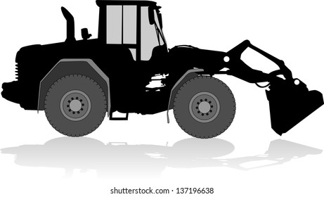 Silhouette of a tractor of road service in profile