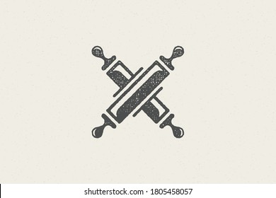 Silhouette of traditional rolling pins crossed as symbol of pastry preparation hand drawn stamp effect vector illustration. Vintage grunge texture for packaging and menu design or label decoration.