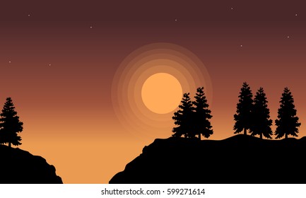 Silhouette of tree lined on hill landscape